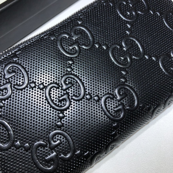 G*u*i gg embossed zippy wallet