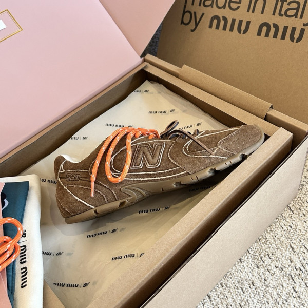 M*um*u x new balance sneaker