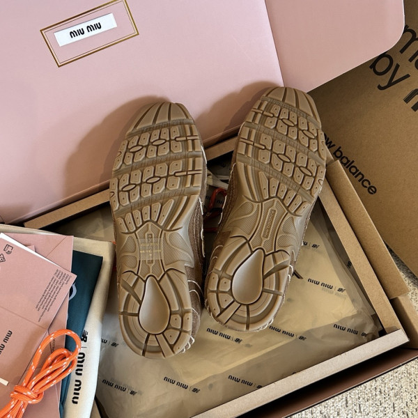 M*um*u x new balance sneaker