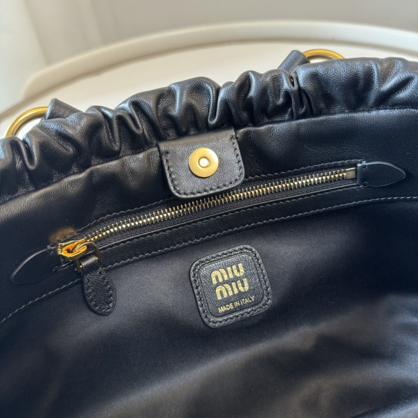 M*um*u joie nappa leather bag